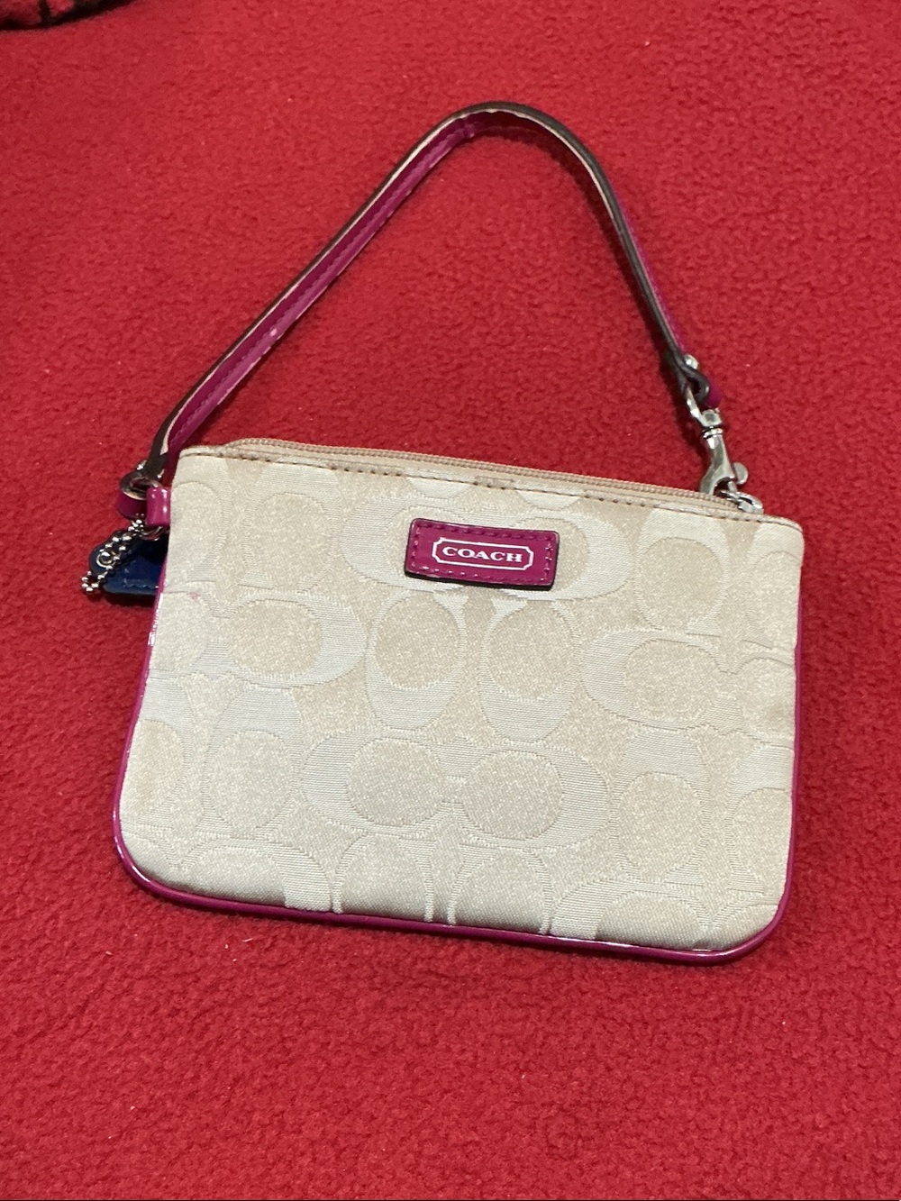 COACH Beige Signature Wristlet with Pink Trim